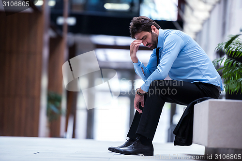 Image of frustrated young business man