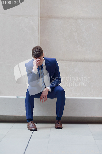 Image of frustrated young business man