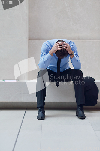 Image of frustrated young business man