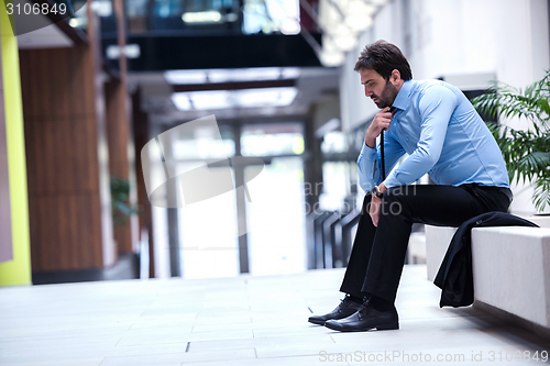 Image of frustrated young business man