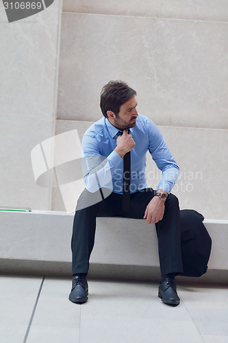 Image of frustrated young business man