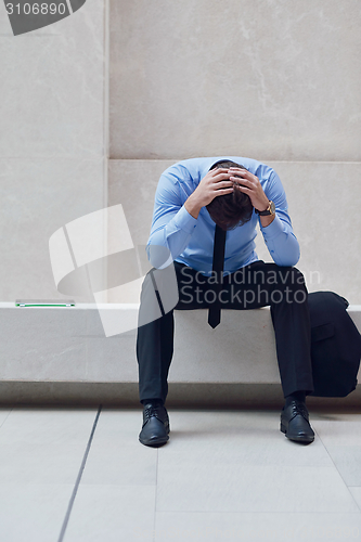 Image of frustrated young business man