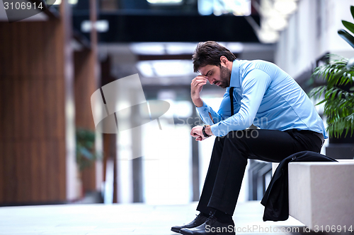 Image of frustrated young business man