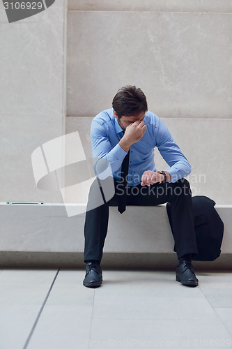 Image of frustrated young business man