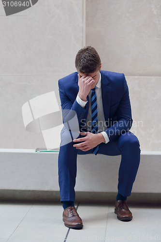 Image of frustrated young business man