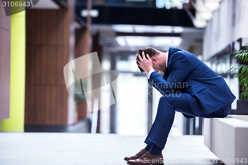 Image of frustrated young business man