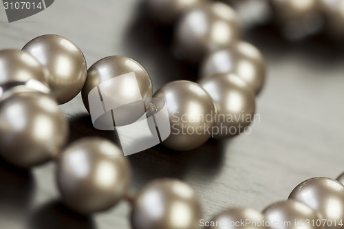 Image of String of shiny grey beads