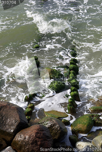 Image of Green stones in the water