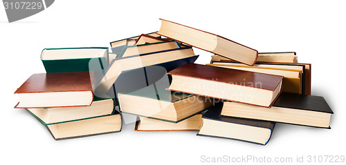 Image of In front piled on a bunch of old books