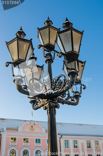 Image of Beautiful street lamp on the background of old buildings