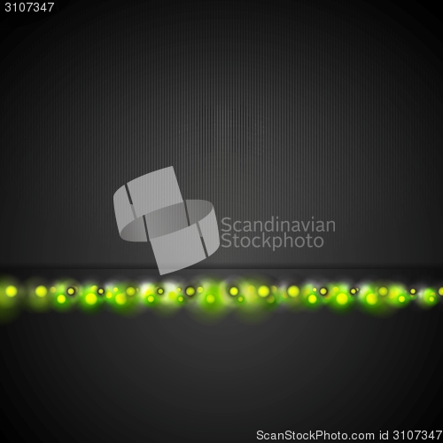 Image of Dark background with green shiny light