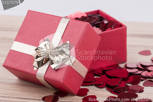 Image of Red hearts confetti in box