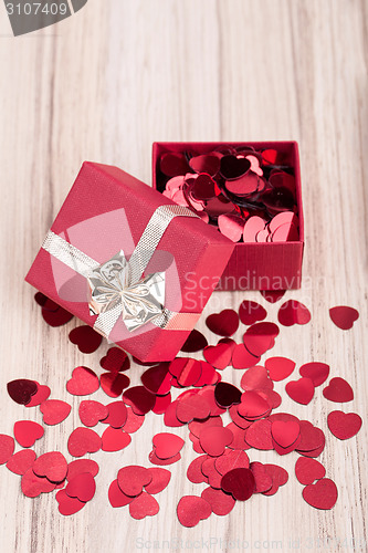 Image of Red hearts confetti in box valentine love concept