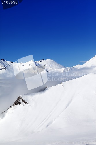 Image of Winter snowy mountains at sunshine day