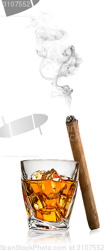 Image of Whiskey with ice and cigar