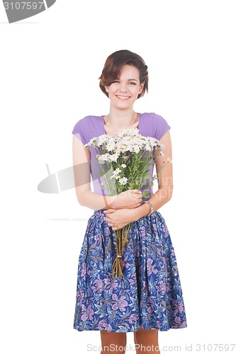 Image of young cute woman with flowers