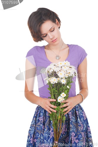 Image of young cute woman with flowers