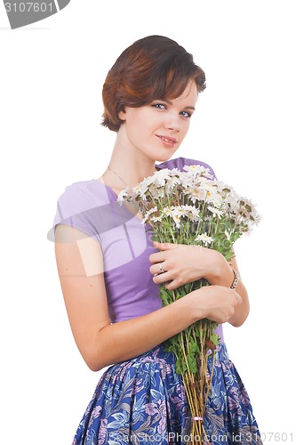 Image of young cute woman with flowers