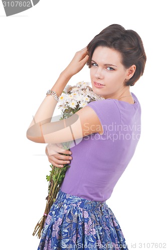 Image of young cute woman with flowers