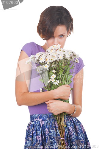 Image of young cute woman with flowers