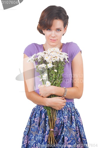 Image of young cute woman with flowers