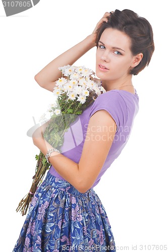 Image of young cute woman with flowers