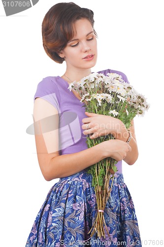 Image of young cute woman with flowers