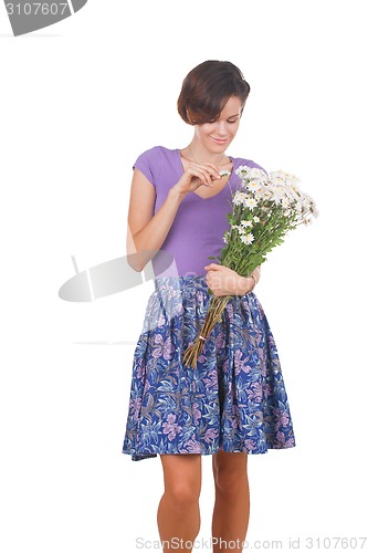 Image of young cute woman with flowers