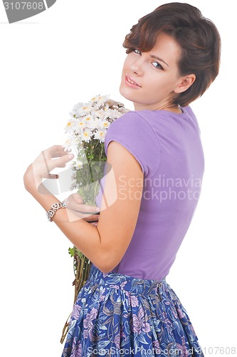 Image of young cute woman with flowers
