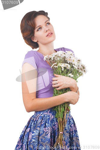 Image of young cute woman with flowers