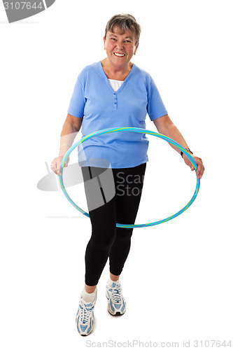Image of Senior woman with hula-hoop