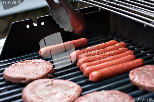 Image of Hot Dogs and Hamburgers on the Grill