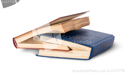 Image of Two old books nested rotated