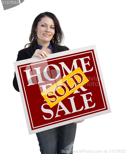 Image of Hispanic Woman Holding Sold Home For Sale Sign on White