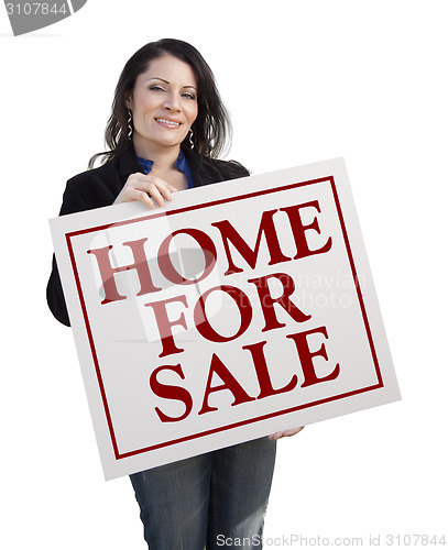 Image of Hispanic Woman Holding Home For Sale Real Estate Sign