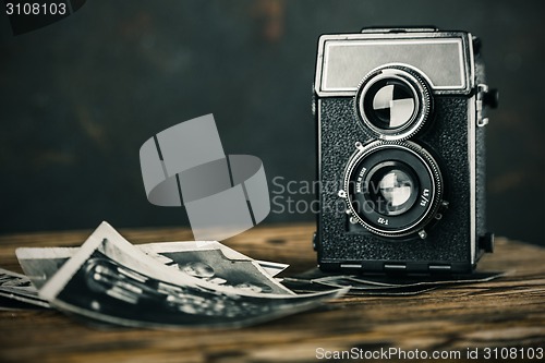 Image of old camera and old pictures