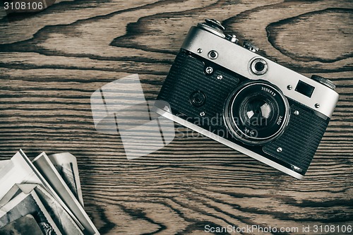 Image of old camera and old pictures