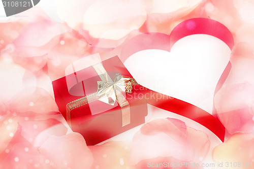 Image of rose petals, heart and valentine present box background