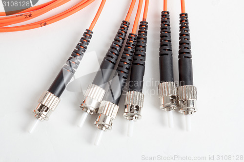 Image of orange fiber optic ST connector patchcord