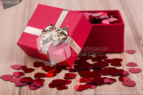 Image of Red hearts confetti in box valentine love concept