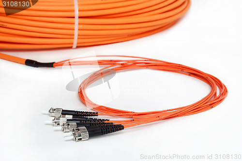 Image of orange fiber optic ST connector patchcord