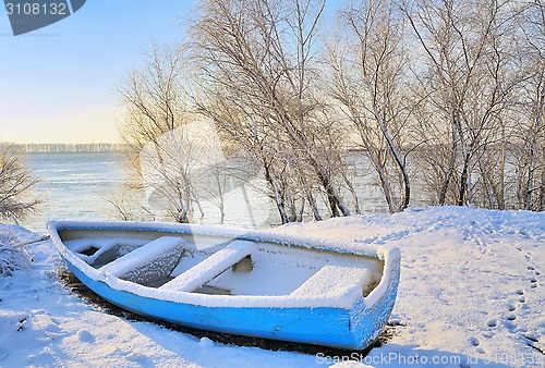 Image of blue boat near danube river