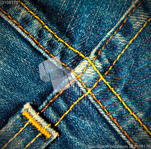 Image of blue old jeans seams
