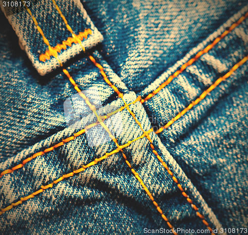 Image of Crossed seams on denim