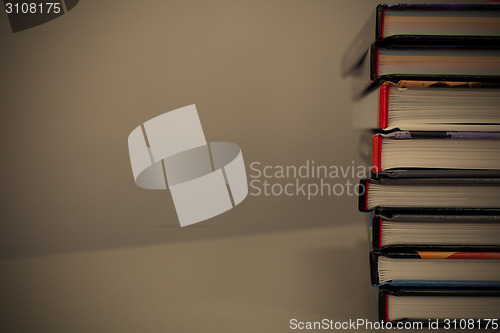 Image of stack of books on the table