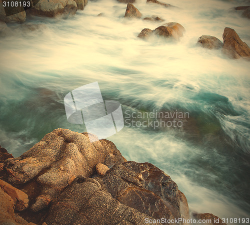 Image of surf and coastal rocks