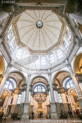 Image of People sightseeing interior of Santa Maria della Salute
