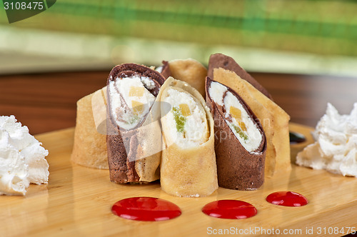 Image of pancake roll with marmalade