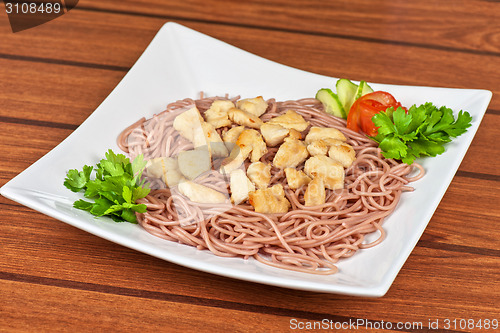 Image of pasta with chicken meat