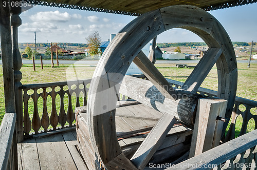 Image of Old wooden water well in village